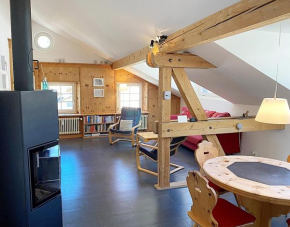 Dachwohnung im Alpenstil, 60m2 für 2P, mit Garage - BM186